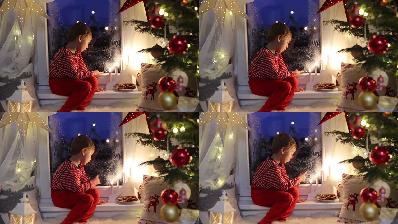 蹒跚学步的孩子，可爱的金发男孩，坐在睡衣上的窗户上，看着撒旦的克劳斯，他周围的圣诞灯