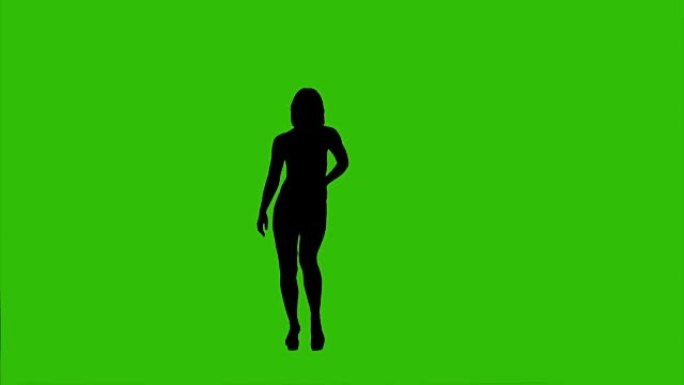 绿色背景上跳舞的女性剪影