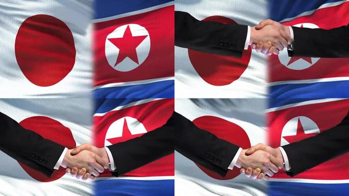 日本和朝鲜握手国际友谊峰会，旗帜背景