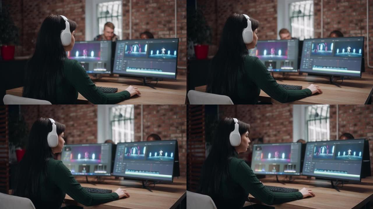 在后期制作工作室进行视频编辑，女人正在使用电影制作软件与计算机合作