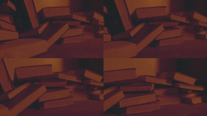 图书馆旧书的概念。灰尘躺在书上，昏暗的光线在烛光下落在书上。没有人再读书了，书是脏的，没有人清理它们