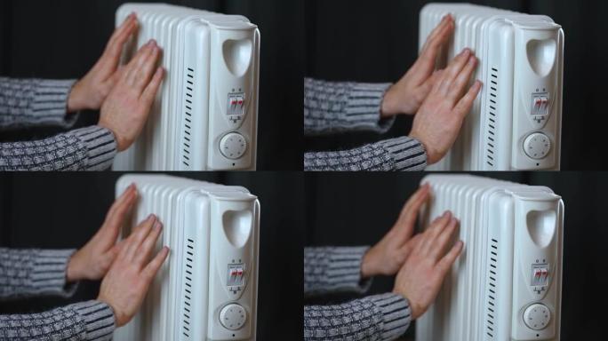 无法识别的人用电加热散热器暖手