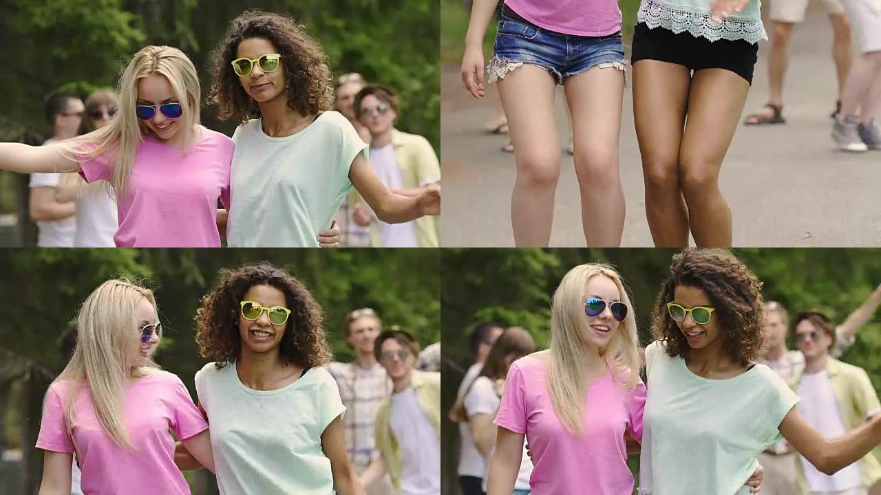 快乐的女学生享受暑假，在酷派对上听音乐跳舞