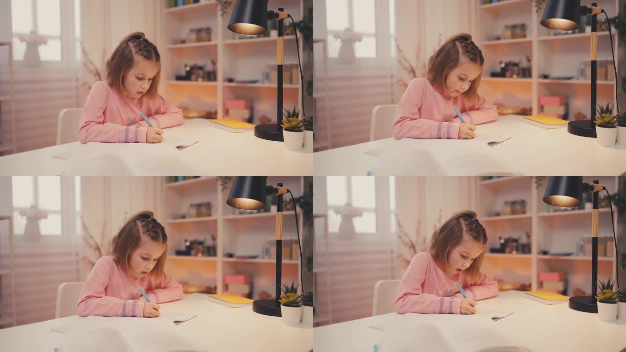 专注的小女孩独自做作业，在家上学，获取知识