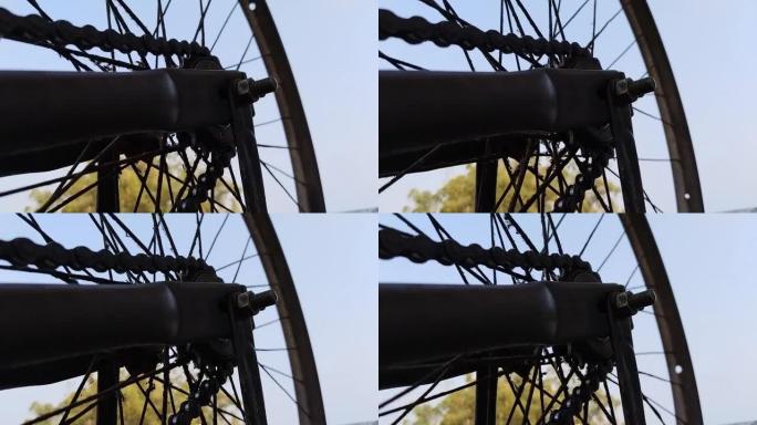 带链条和链轮的后轮的自行车细节视图