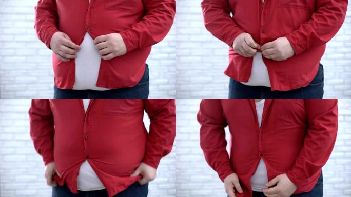 肥胖的男人试图扣上红色衬衫，外观不安全感，健康