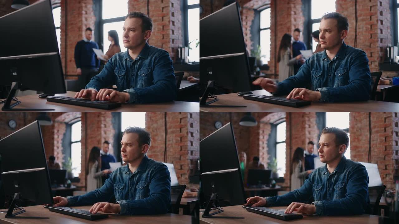 在办公室使用计算机的男性工程师，在工作场所使用技术专家的肖像