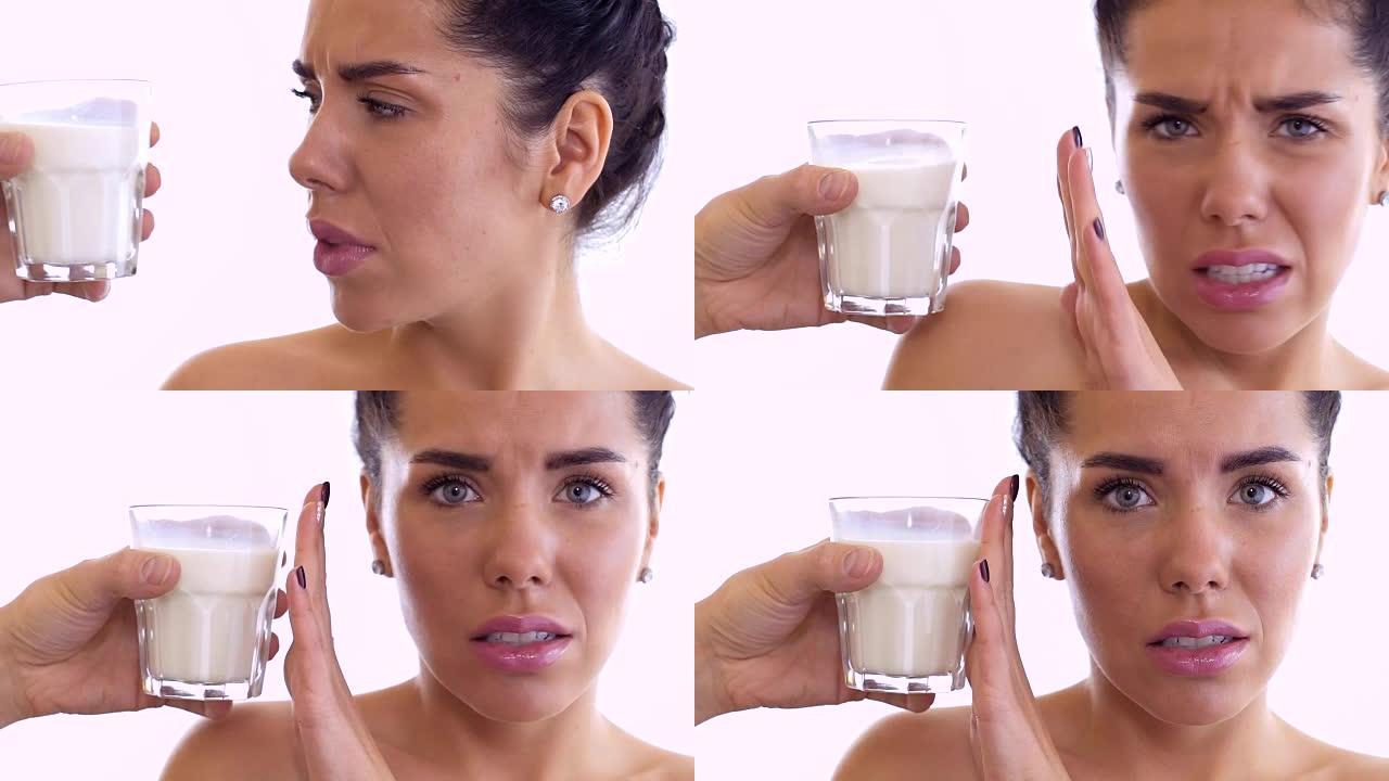 年轻女子拒绝喝一杯牛奶