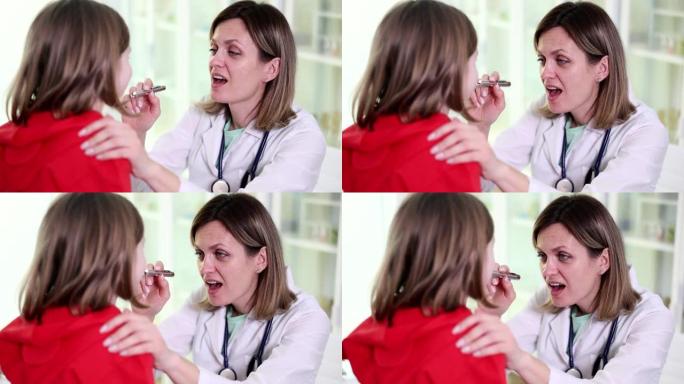 耳鼻喉科医生检查小女孩的喉咙和嘴巴