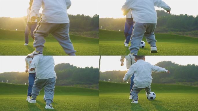 小男孩和妈妈在草地嬉戏踢足球温馨家庭父母