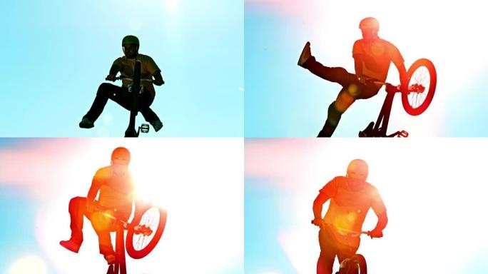 SLO MO男DJ骑自行车的人在耀斑中做一个把戏