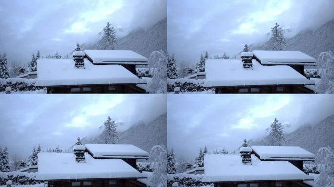 山中一座厚厚的积雪覆盖的屋顶的静态拍摄