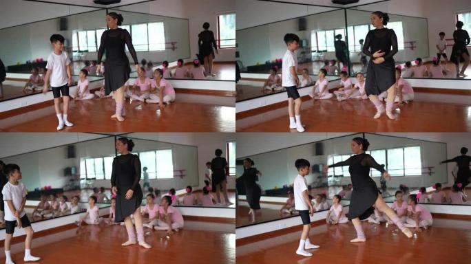 芭蕾舞老师在舞蹈工作室的芭蕾舞课上教男孩