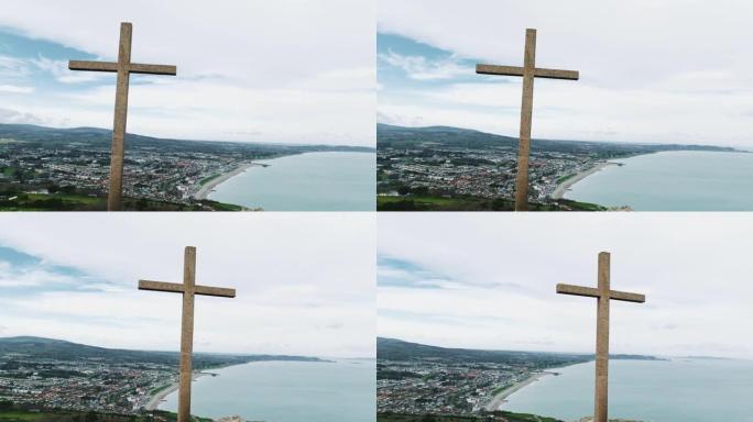 欧洲爱尔兰山顶，宗教悲痛景观背景横幅全景，山上十字架鸟瞰图，山顶混凝土十字架，山顶基督教十字架符号，