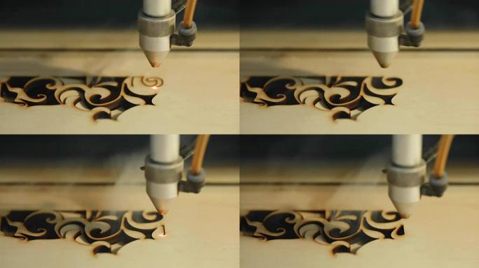 激光切割木材的机器关闭切割刨花板，冒烟。红色光束