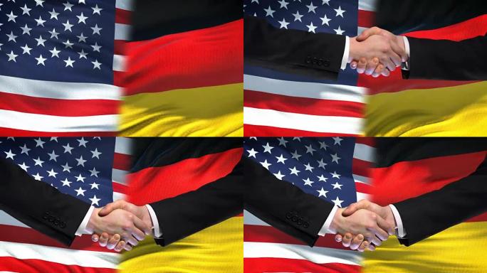 美国和德国握手，国际友谊，旗帜背景