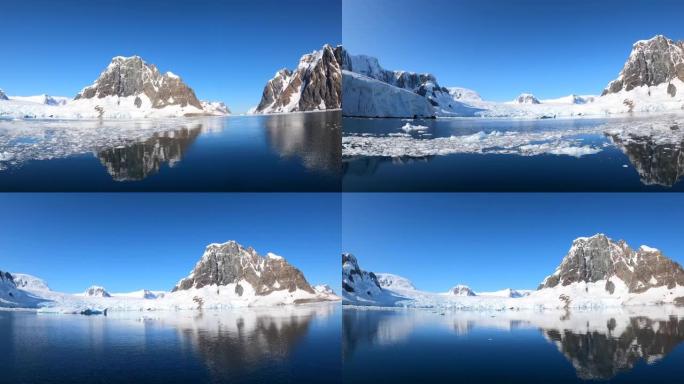 南极水面背景上的雪山时间流逝。