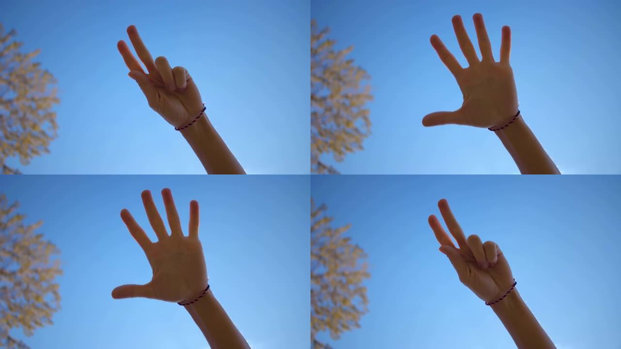 用手指将男性手掌侧的手数到五个。实时