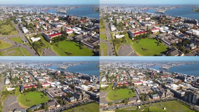 在阳光明媚的日子里，新南威尔士州纽卡斯尔港口城市的空中无人机视图