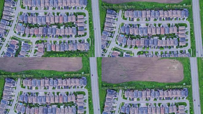 夏季傍晚中产阶级住宅的鸟瞰图。美国邻里郊区。住宅和房屋建造者之间的格局很强。房地产。