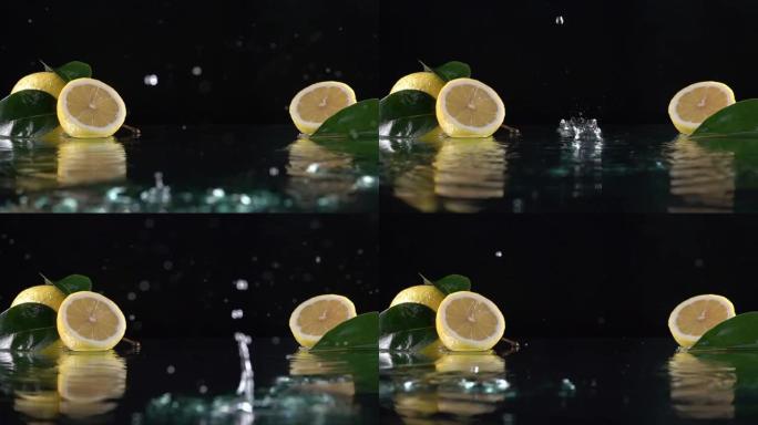 清洁柠檬黑色背景滴水。慢动作镜头