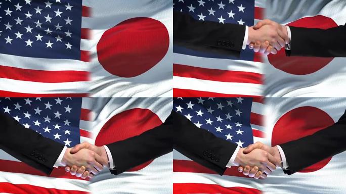 美国和日本握手，国际友谊，旗帜背景