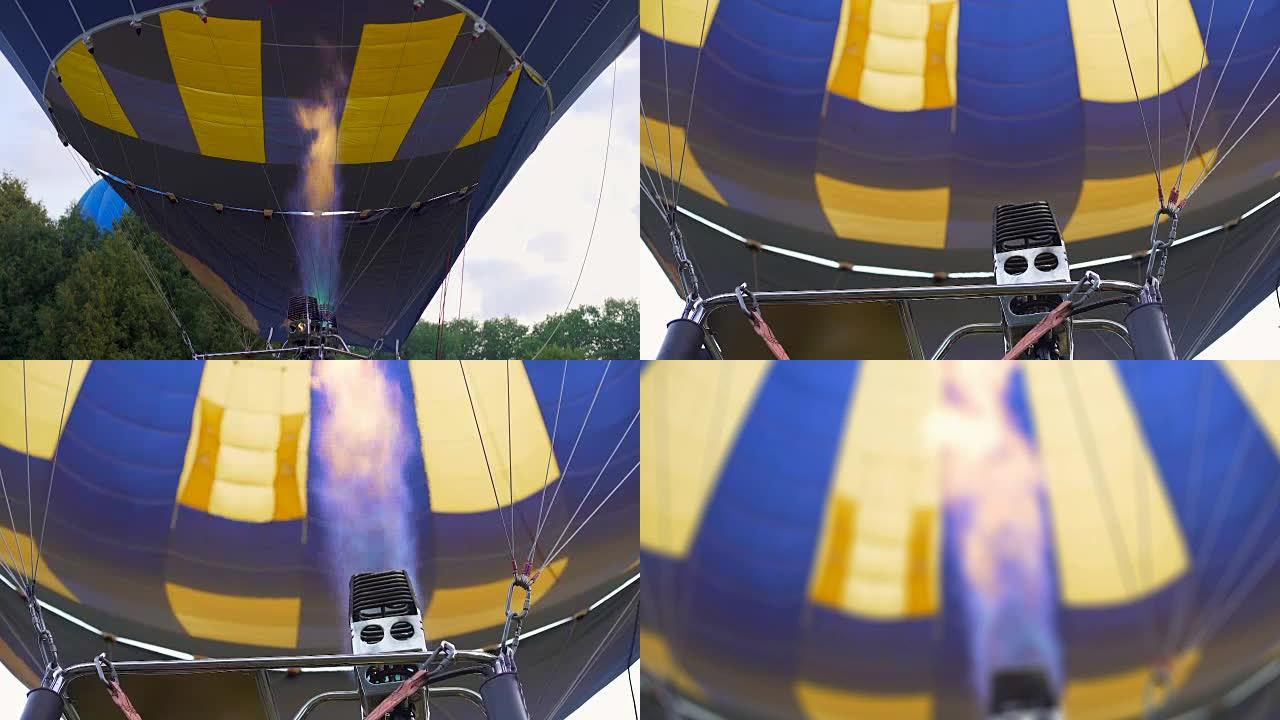热气球燃烧器给信封充气的视图，为展示做准备