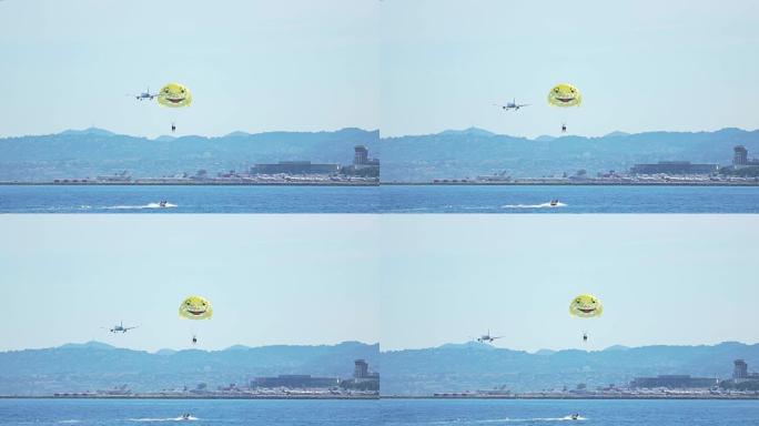惊险的降落伞在海上飞行，滑翔伞运动，游客享受休息