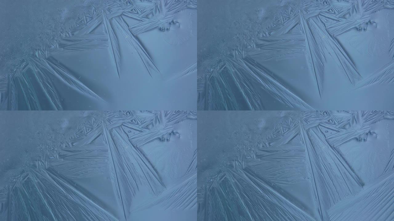 冰冻窗户的4k视频，窗户上生长的冰晶