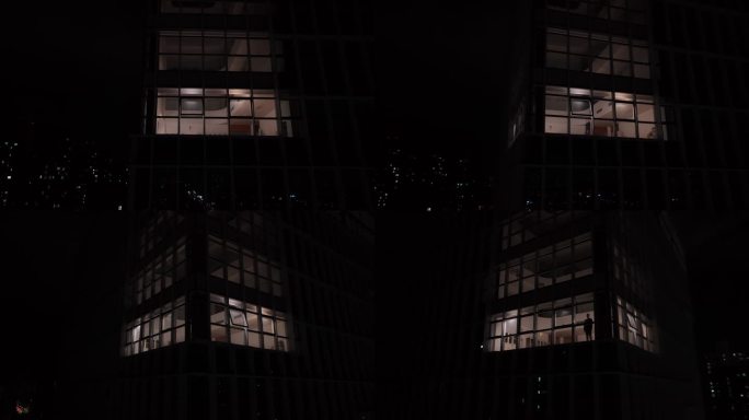 夜晚写字楼独自一人俯瞰城市【有版权】