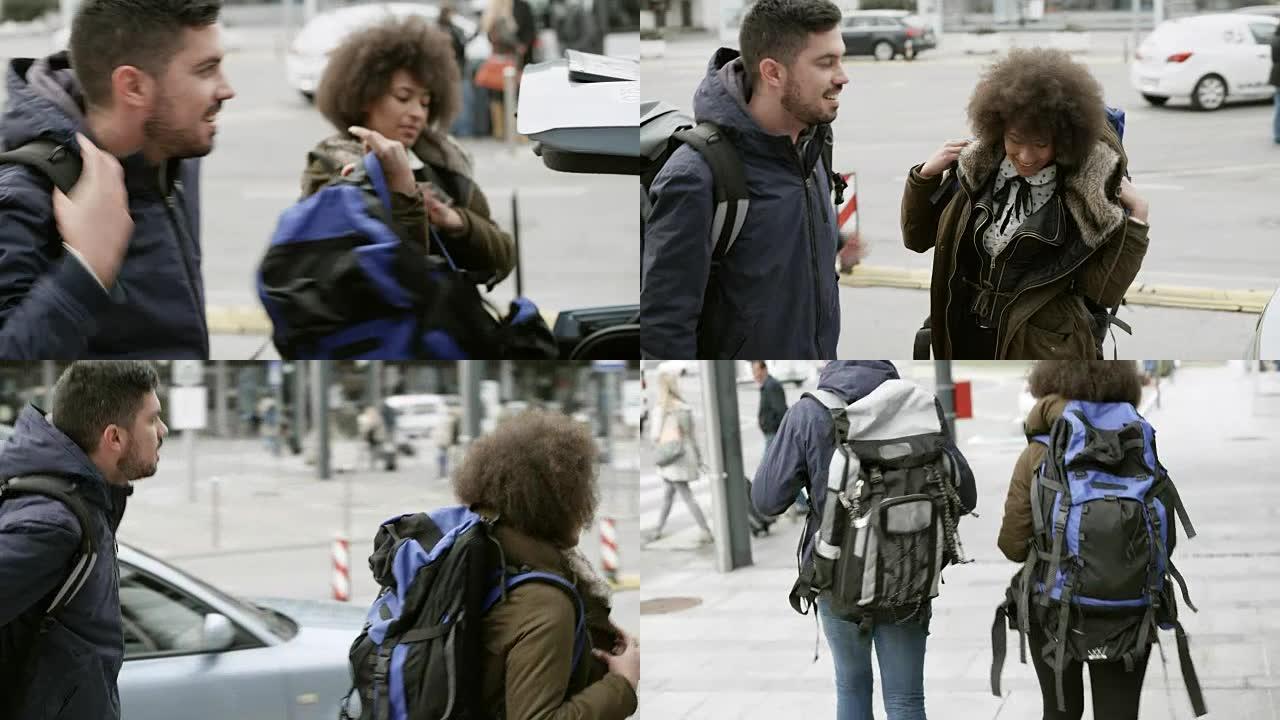 到达机场时，夫妇将背包从出租车中取出