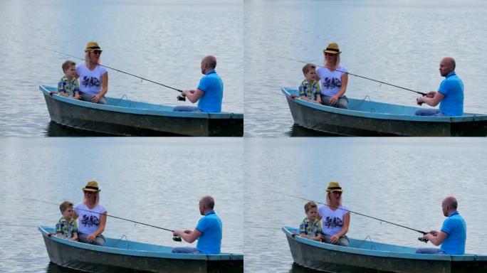 父亲与家人在河上钓鱼