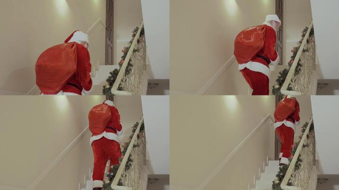 圣诞老人带着他的大红色礼物袋悄悄溜进房子