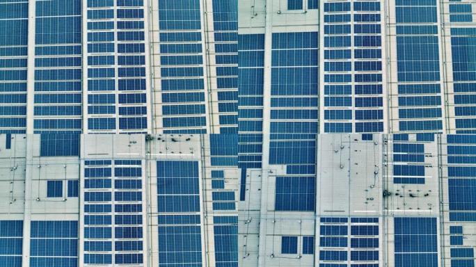 工厂建筑屋顶太阳能电池板的鸟瞰图