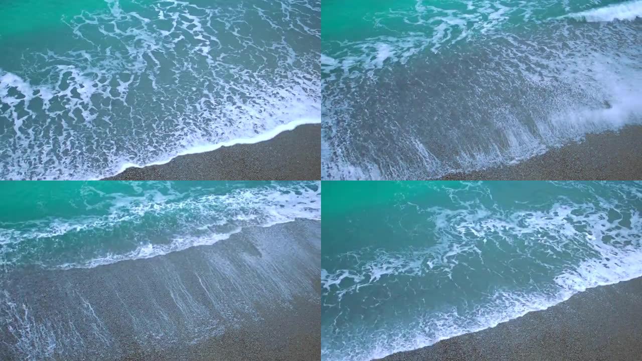 透明的海浪在沙滩上冲刷，永恒，不可阻挡的力量