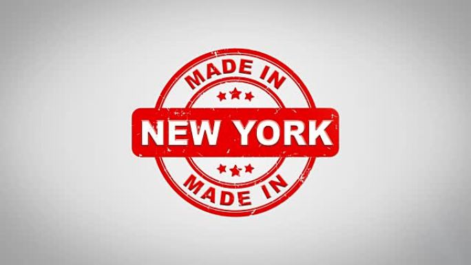 纽约制作签名盖章文字木制邮票动画。红色墨水在干净的白纸表面背景与绿色哑光背景包括在内。