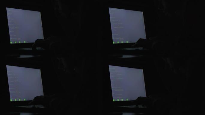 程序员晚上在笔记本电脑上键入代码，创建新软件，工作狂