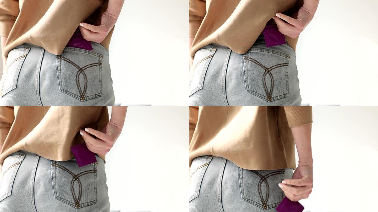 女人从裤子口袋里掏出避孕套的后视图4k电影慢动作
