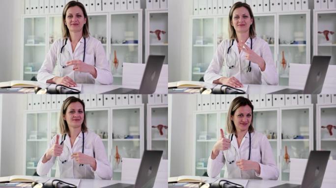 女医生在诊所4k电影慢动作中展示手术治疗和竖起大拇指的手势
