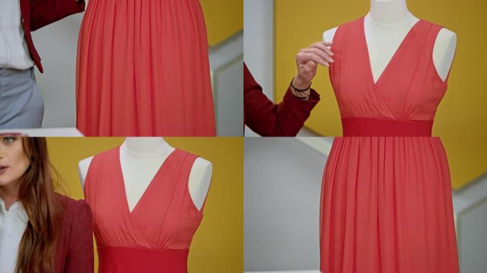 TU女性的手指出了信息广告中呈现的连衣裙上的细节