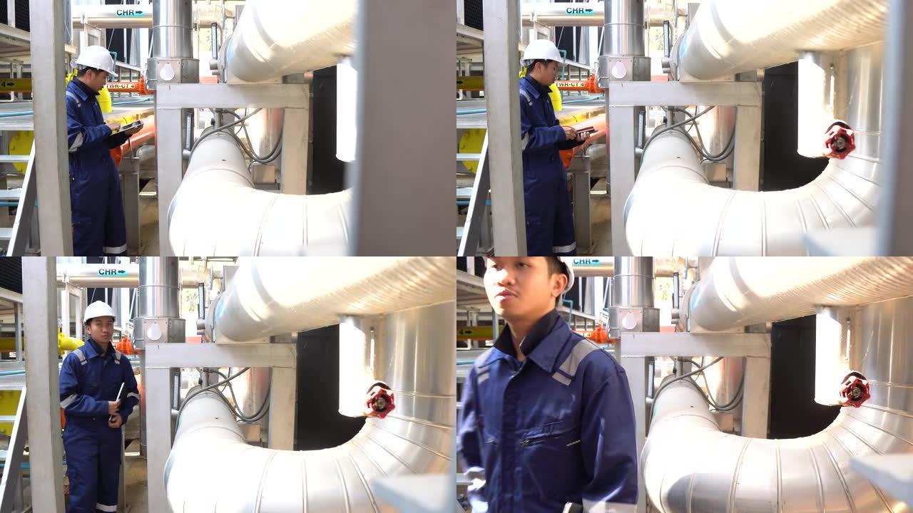 化工厂净化设备室，技术员检查设备状况