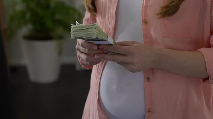 孕妇拒绝收钱，卖孩子的概念，非法收养