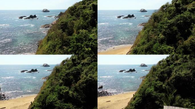 海岸线和享受无边泳池的女人的空中风景