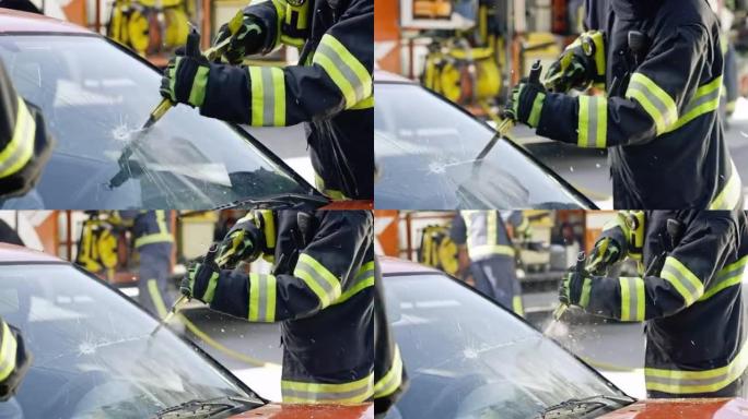 消防员切开汽车挡风玻璃