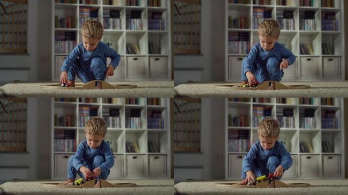 一个小男孩蹒跚学步的肖像在客厅地毯上玩五颜六色的木制火车。好奇的男孩喜欢他的新玩具，专注于他的游戏。