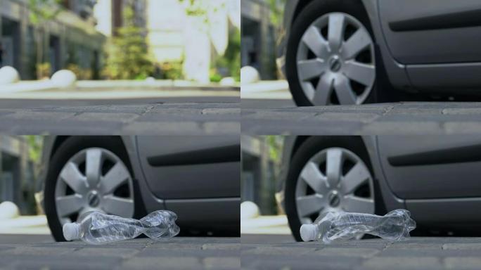 司机在开车时扔塑料瓶，污染概念