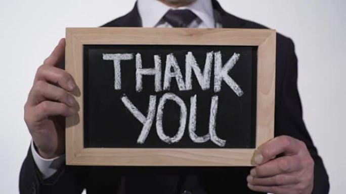 谢谢您写在商人手中的黑板上，捐款感谢