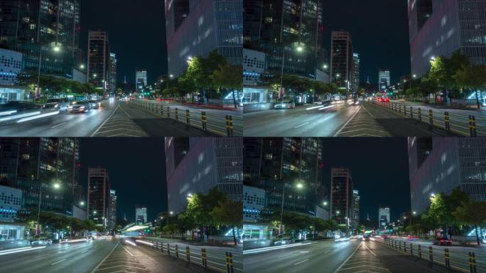 新龙山站公交车站交通首尔天际线夜间流逝与繁忙的宽路街的摩天大楼