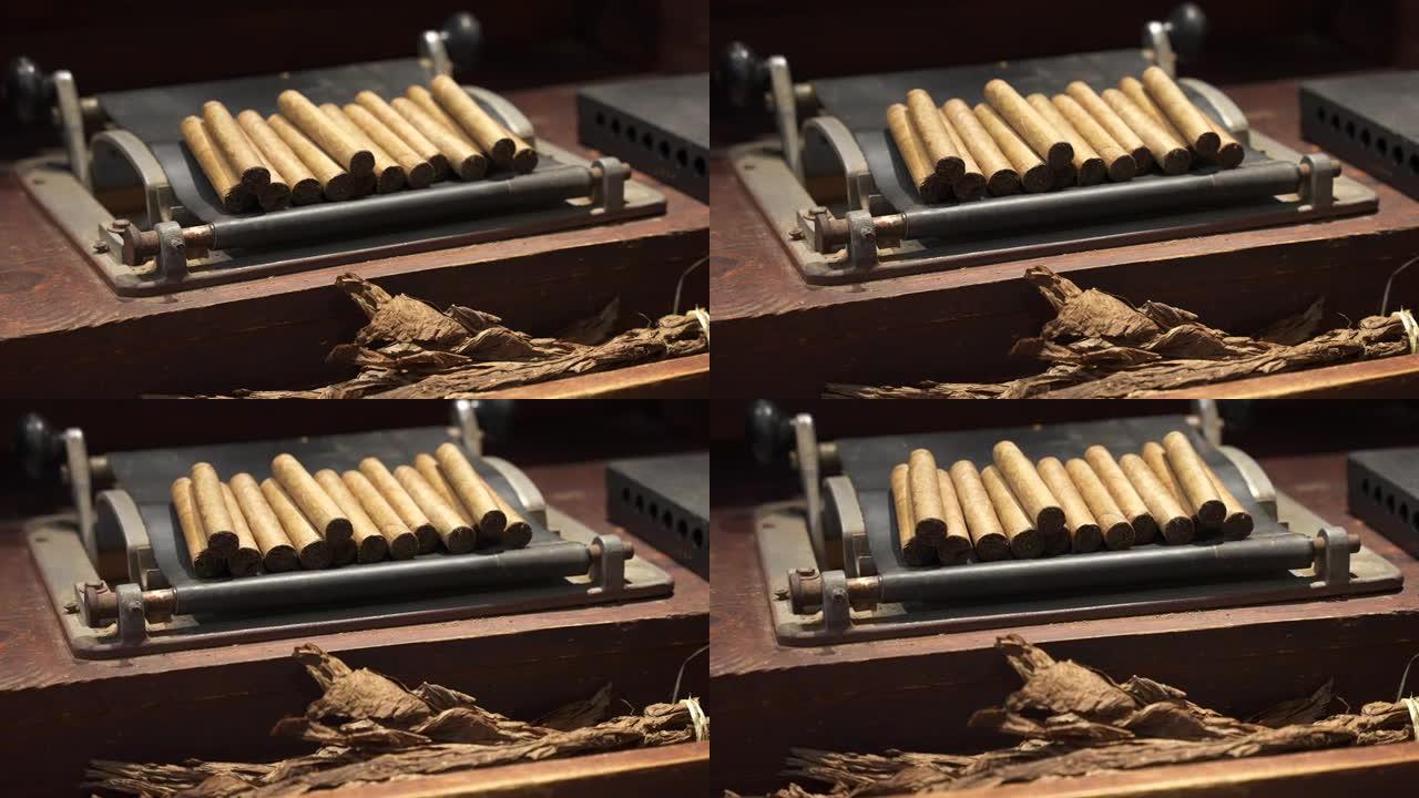 手辊工具上的优质古巴雪茄堆叠。世界上最昂贵的雪茄