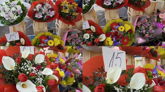 男人在花店为情人选择最美丽，最昂贵的花束